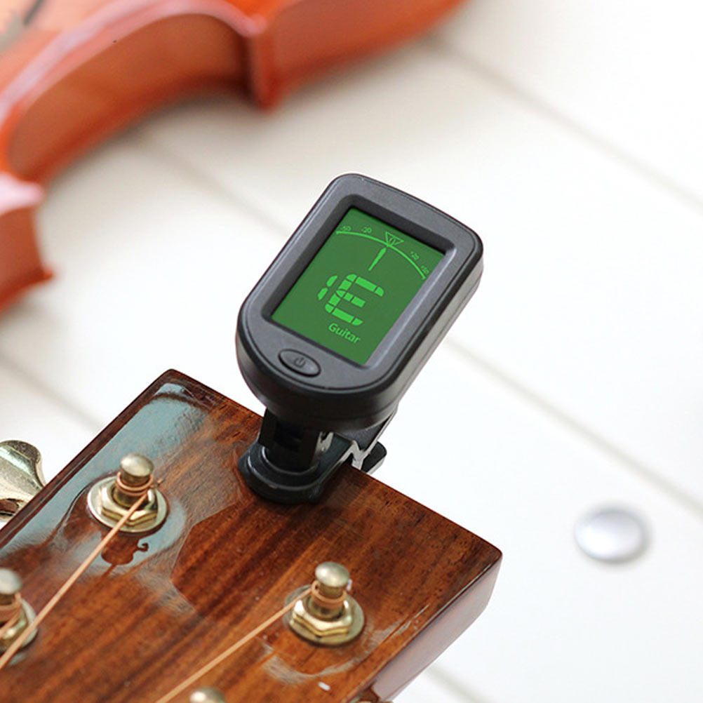 Universal Tuner for Guitar Vio - Violin Musical Instrument 评论和价格
